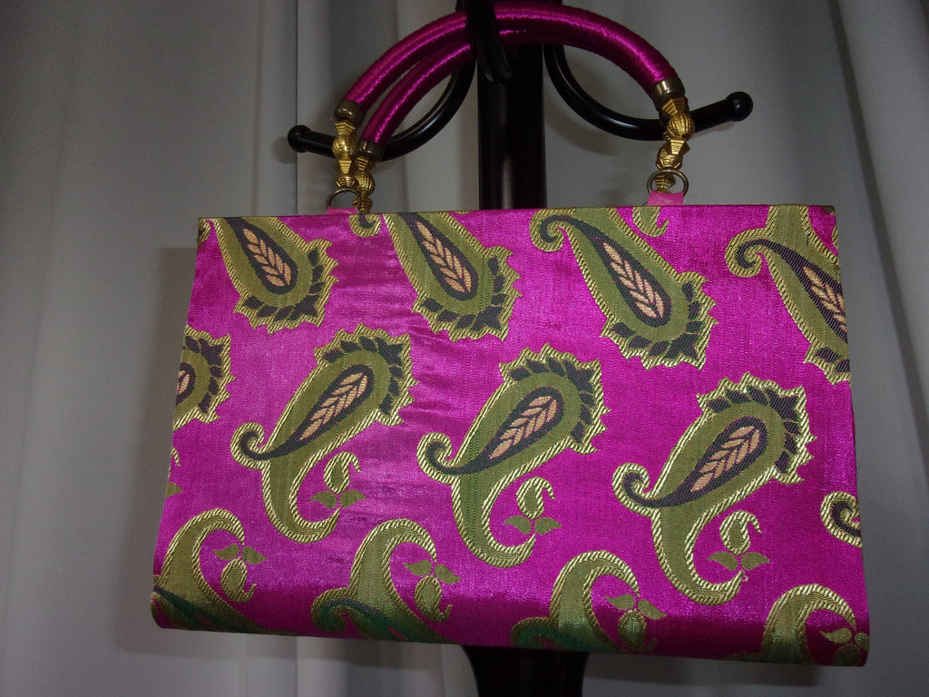 Vintage look top handle bag
